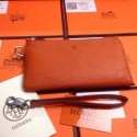 Replica 2015 Hermes 7-shaped zipper wallet 509 orange HV06170KG80